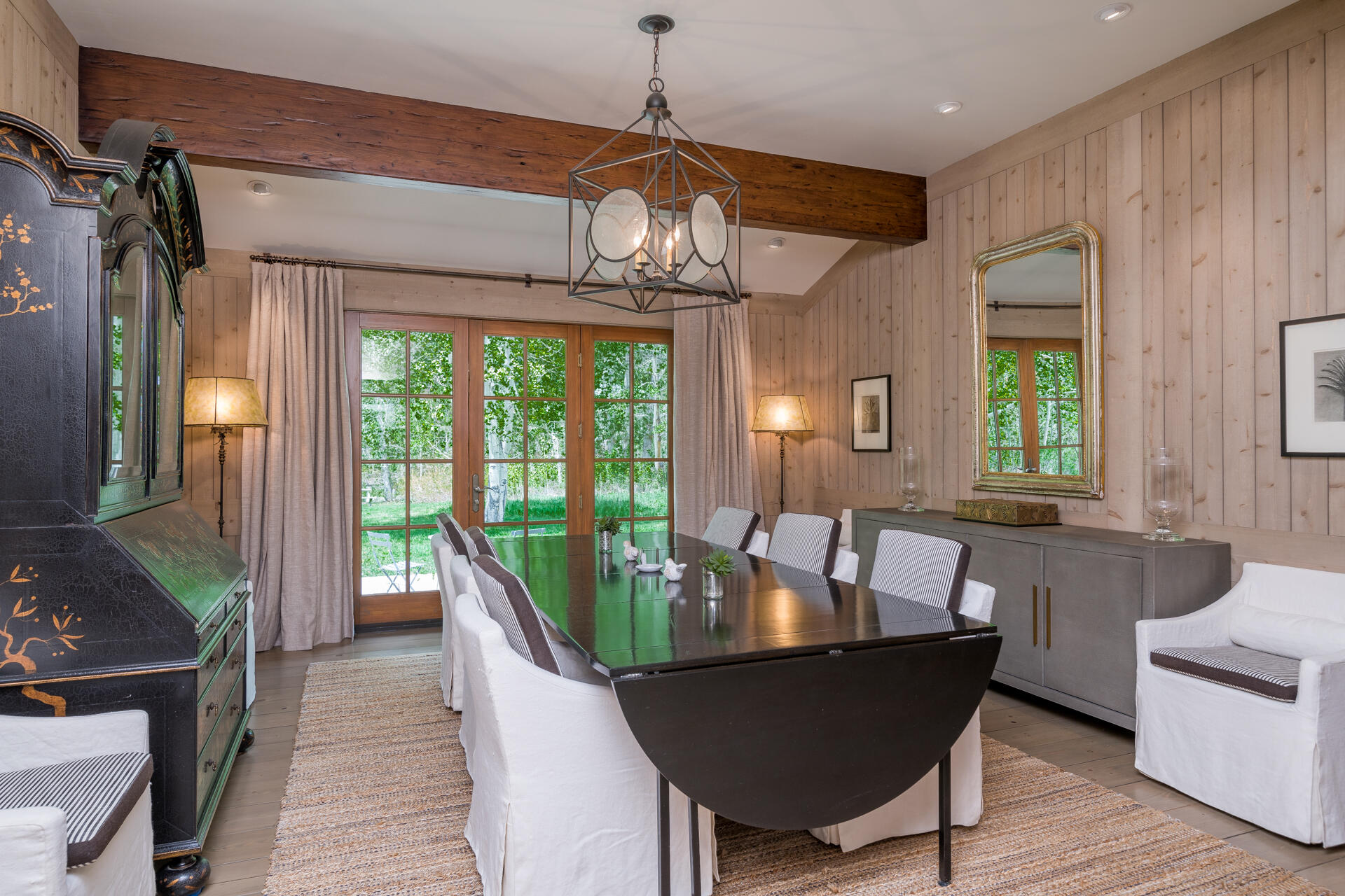 Welcoming dining room with french doors