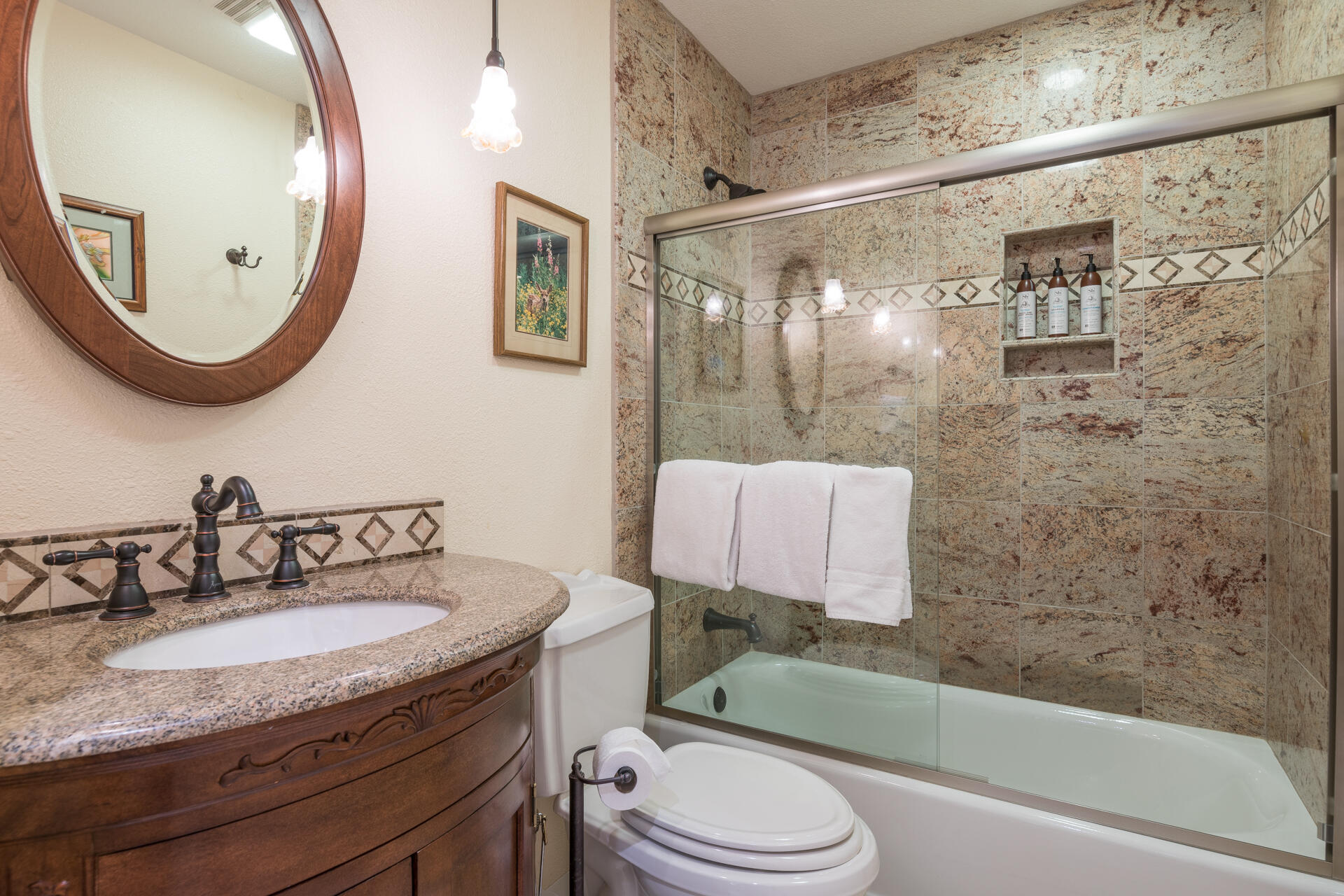 Guest bathroom - tile floor, granite and