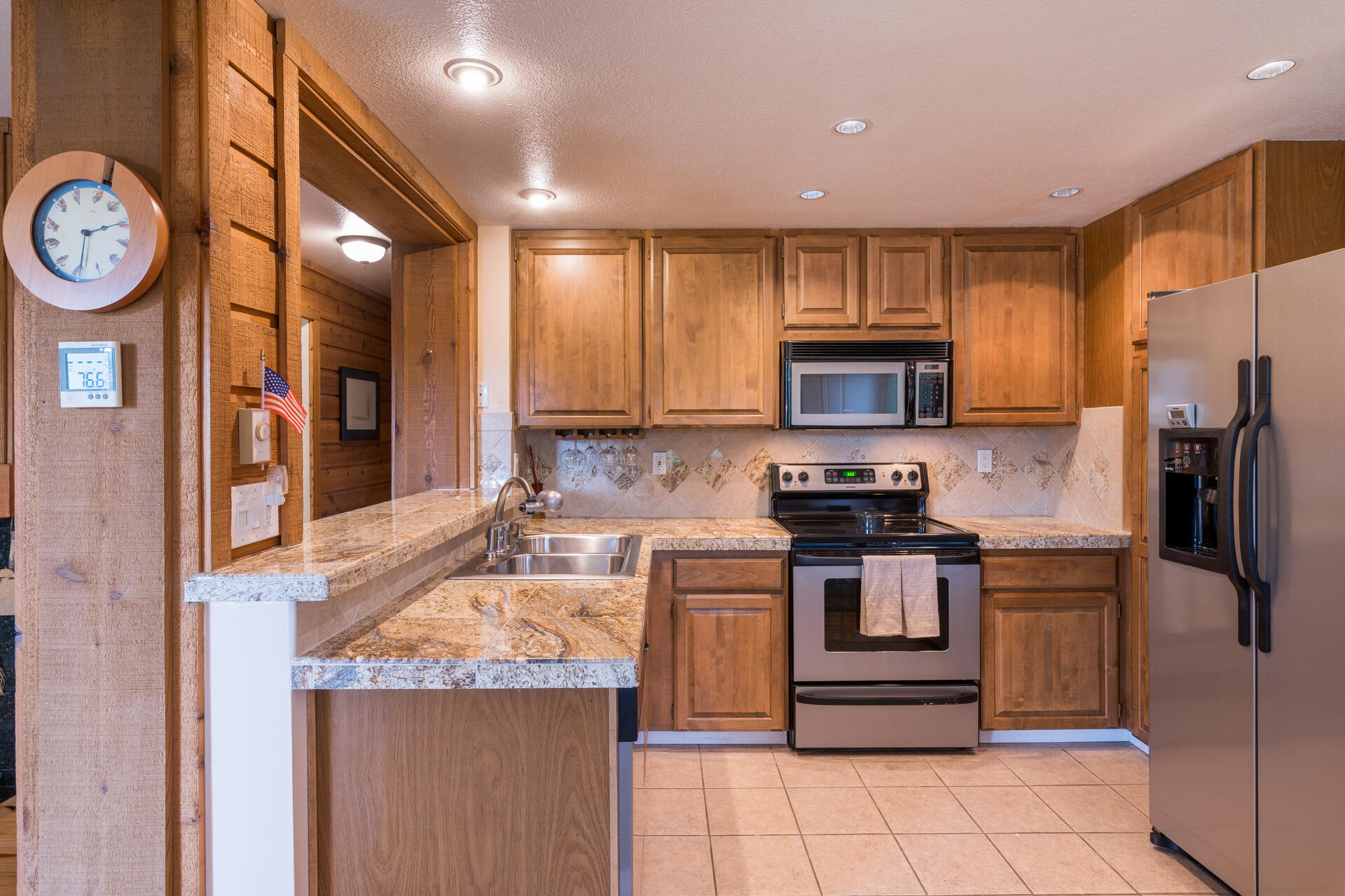 Open kitchen, granite countertops & tile