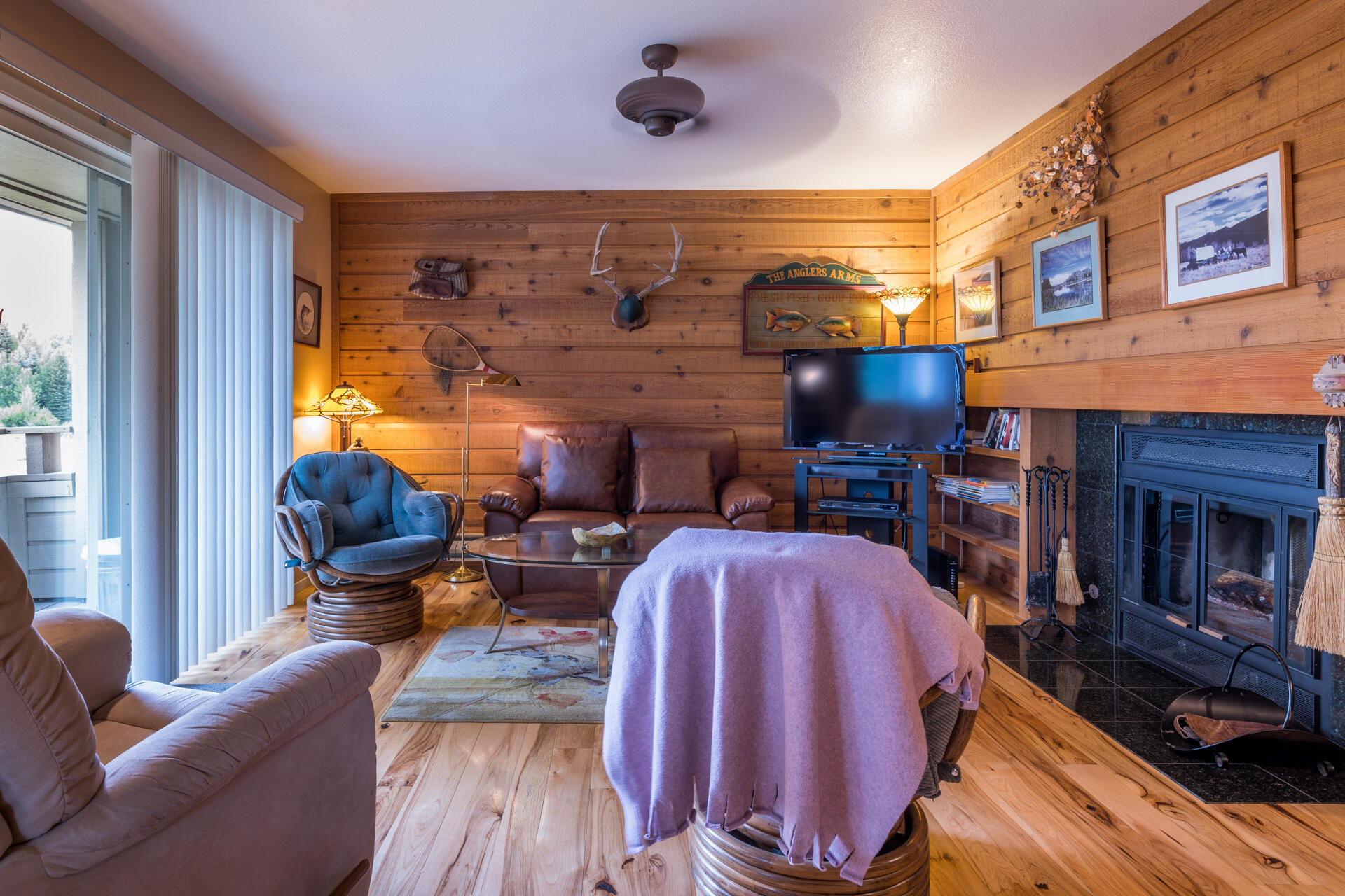 Living room with hardwoods & wood burnin