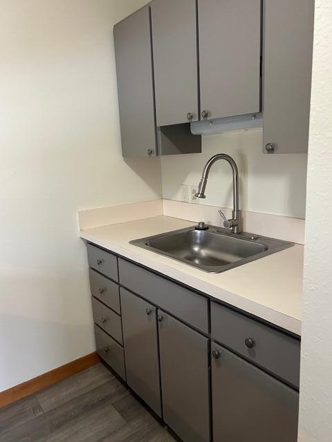 kitchen sink newly painted cupboards