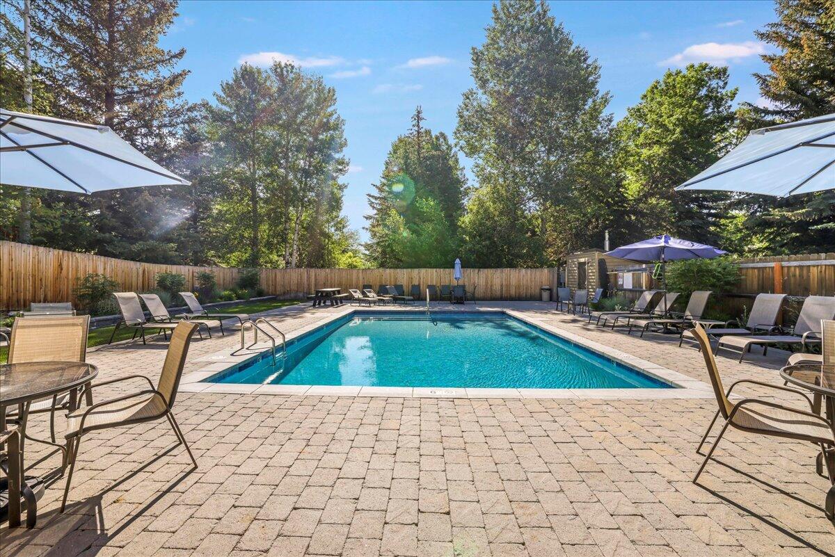 Pool, seating and umbrellas