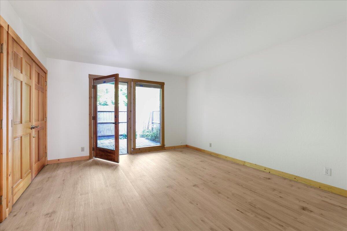 Primary bedroom onto patio and shed