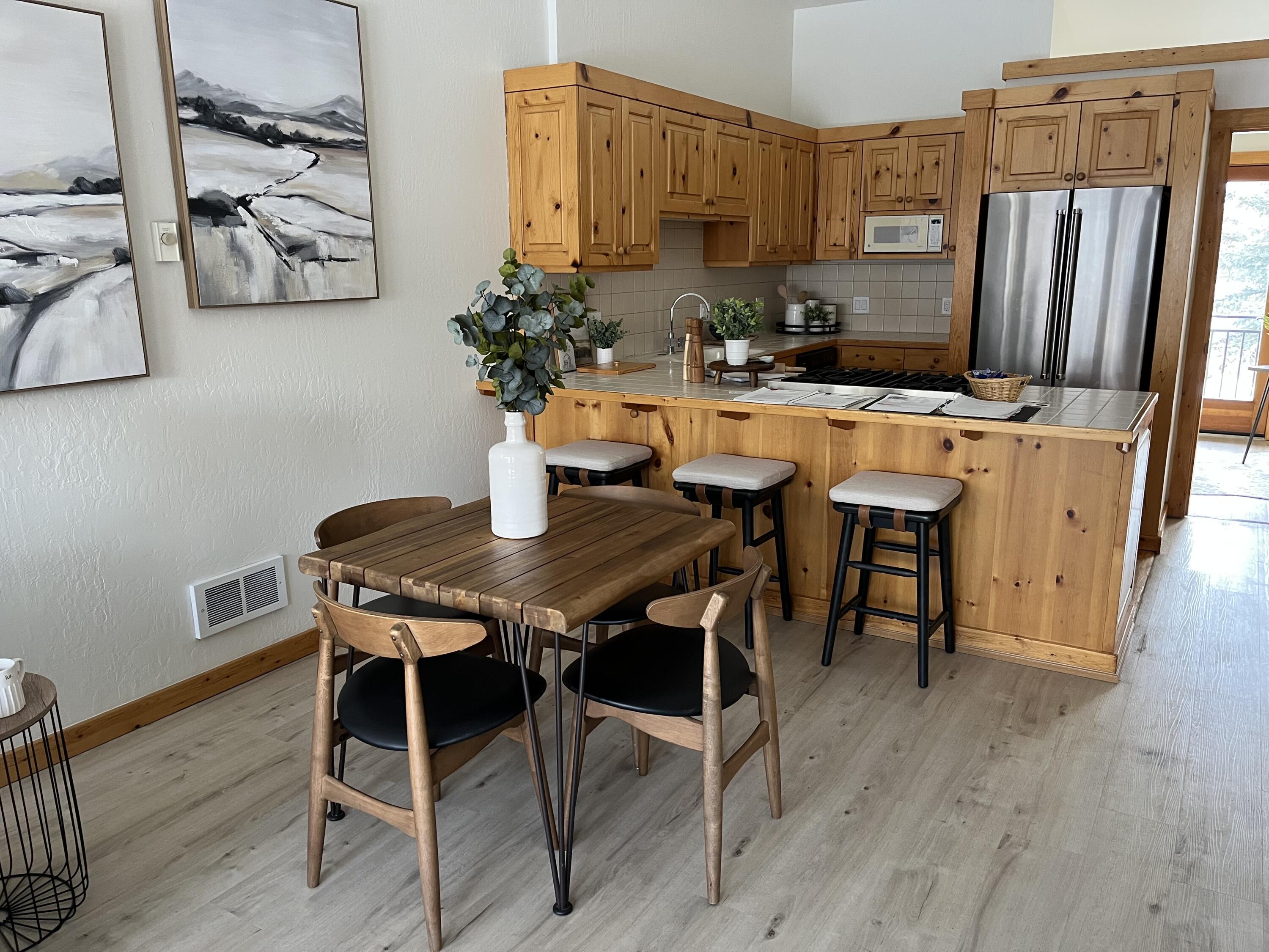 Facing kitchen, bar seating