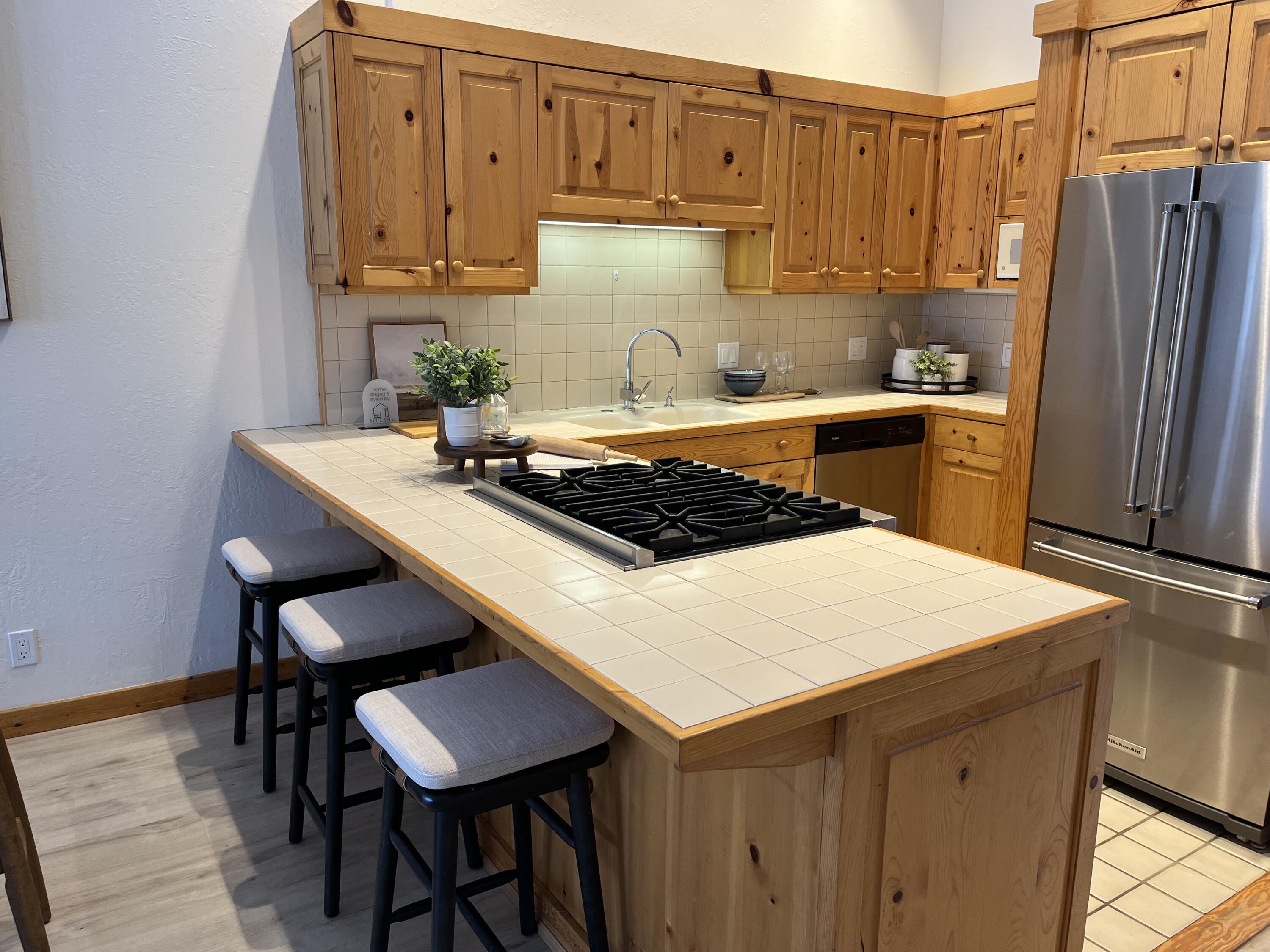 Kitchen with stainless appliance