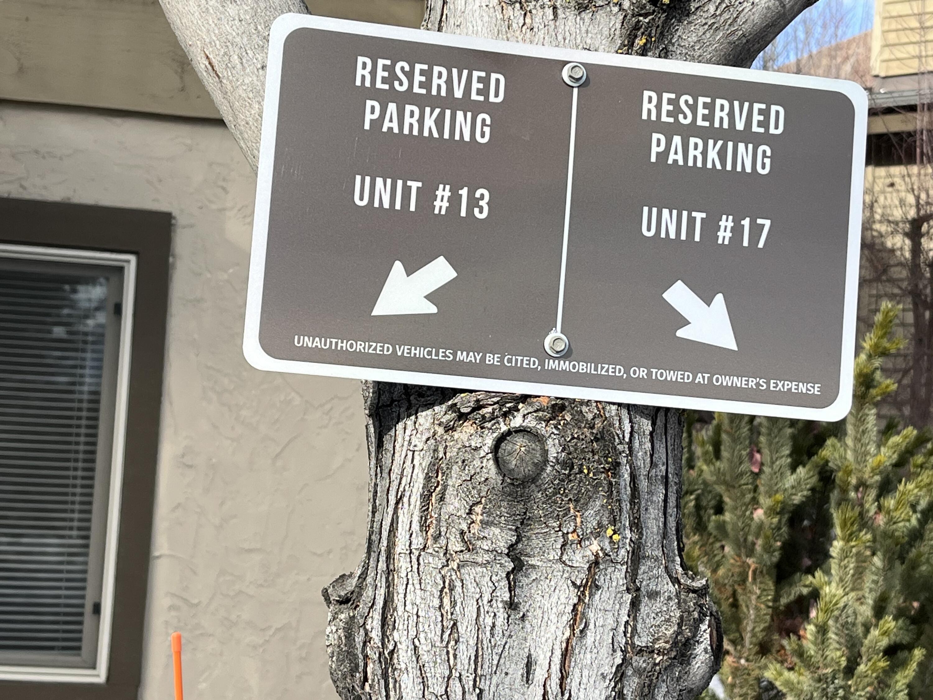 Unit #13 parking space at front door