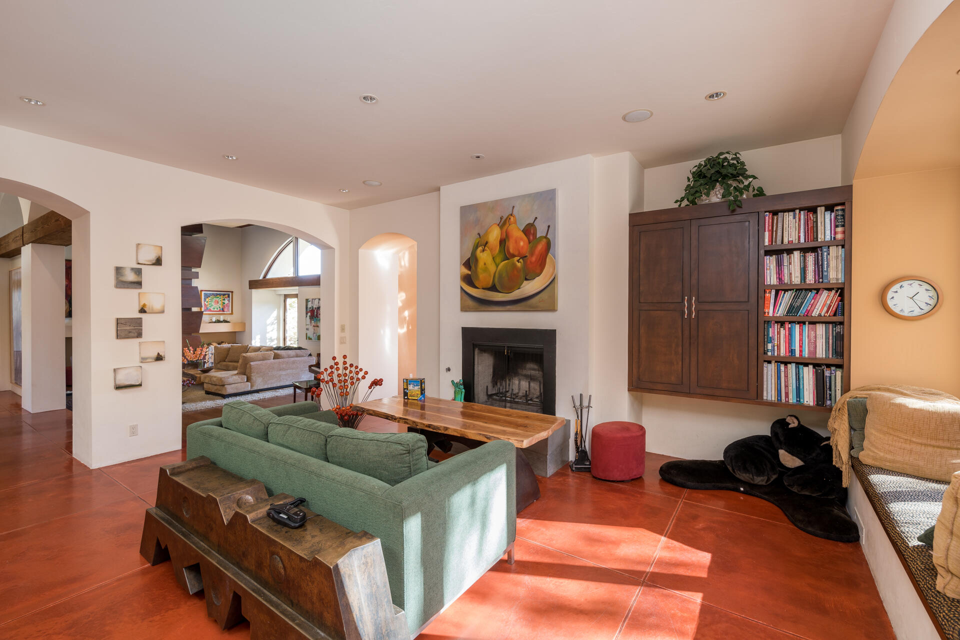 Seating area and fireplace by kitchen
