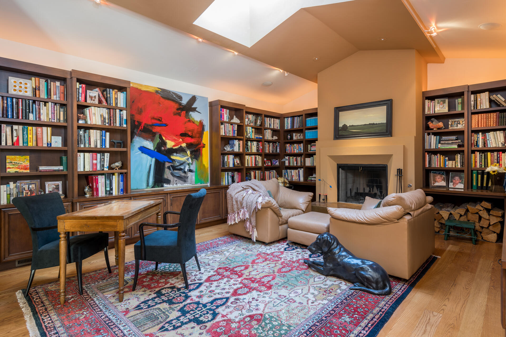 Library and fireplace in primary