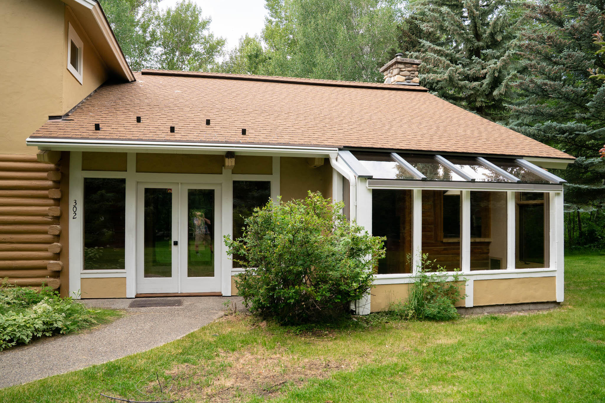 Exterior Entrance and Kitchen Sunroom