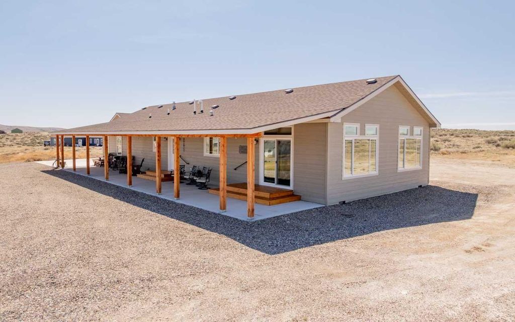 Photo of 365 Broken Spoke Loop Loop, Greybull, WY 82426 (MLS # 20261587)