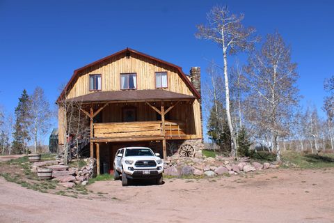 Photo of 87 Moose Hollow Road Rd, Robertson, WY 82944 (MLS # 20262041)
