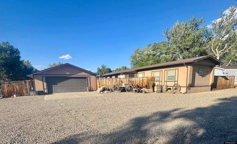 Photo of 115 E Warren St, Thermopolis, WY 82443 (MLS # 20264542)