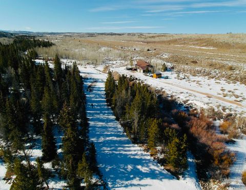 Photo of 70 Blue Heron Way Way, Robertson, WY 82944 (MLS # 20260351)