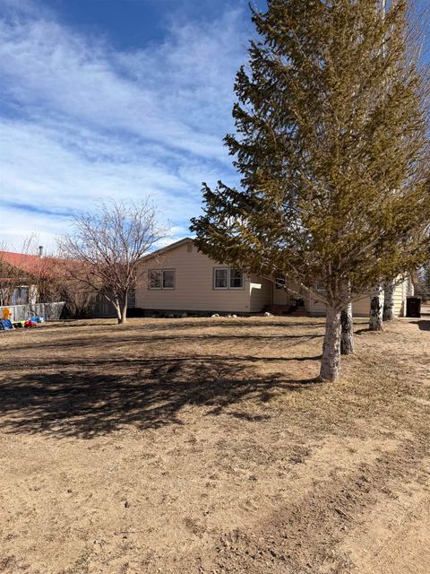 Photo of 511 Wiley Ave Ave, Encampment, WY 82325 (MLS # 20261042)