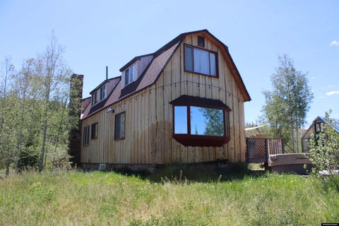Photo of 87 Moose Hollow Road Rd, Robertson, WY 82944 (MLS # 20264988)