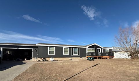 Photo of 130 BUCKBOARD DR Dr, Mountain View, WY 82939 (MLS # 20260445)