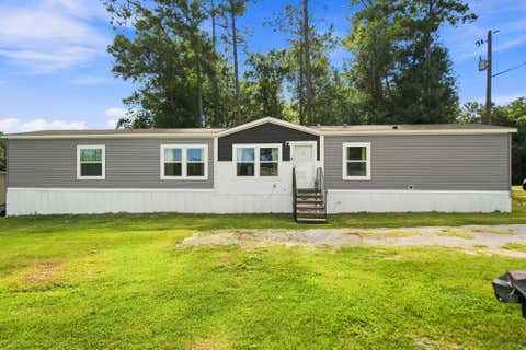 Photo of 1063 Lilinoe Way, Diamondhead, MS 39525 (MLS # 148280)