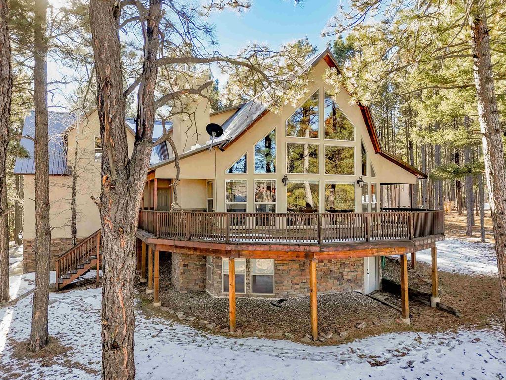 Photo of 28 Tam O Shanter, Angel Fire, NM 87710 (MLS # 114375)