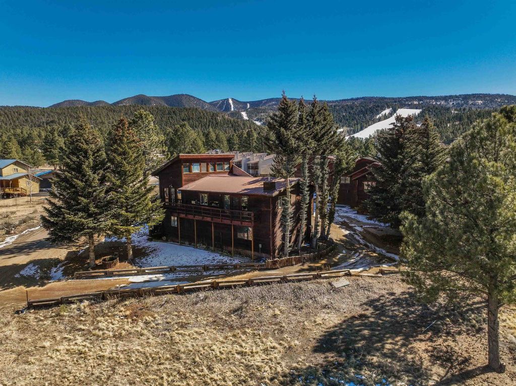 Photo of 13 Arapaho Ln, Angel Fire, NM 87710 (MLS # 114725)
