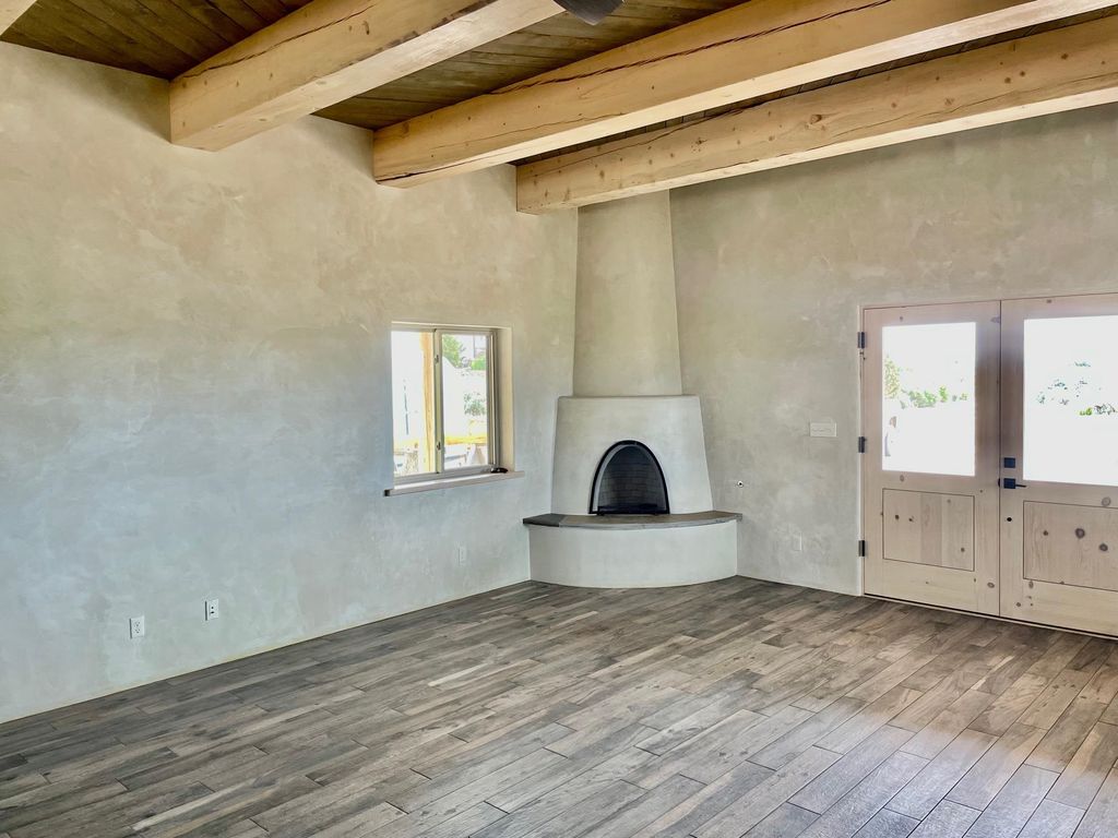 Photo of 11 Laguardia Rd, Ranchos de Taos, NM 87557 (MLS # 113766)