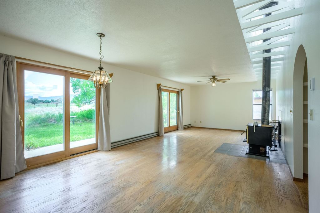 Photo of 128 Dona Ana Dr #215, Taos, NM 87571 (MLS # 113770)