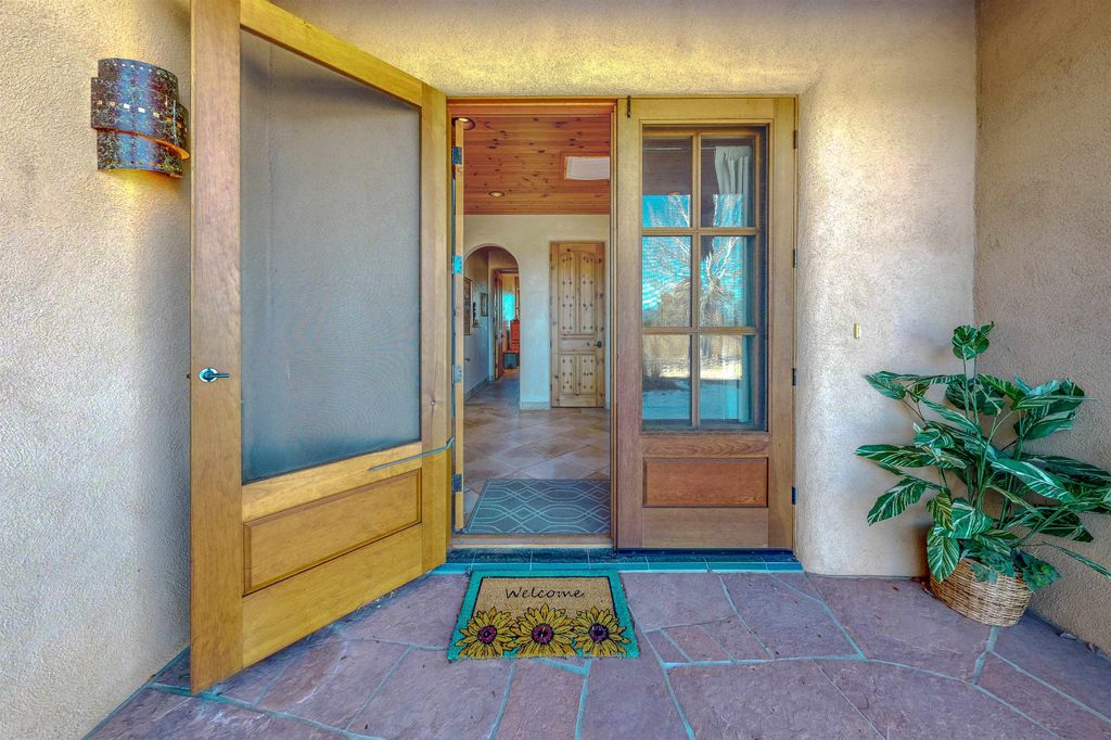 Photo of 98 Calle Mirador, Ranchos de Taos, NM 87557 (MLS # 114435)