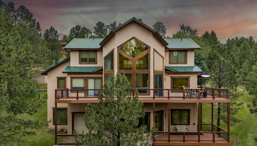 Photo of 47 Woodlands Dr, Angel Fire, NM 87710 (MLS # 113647)