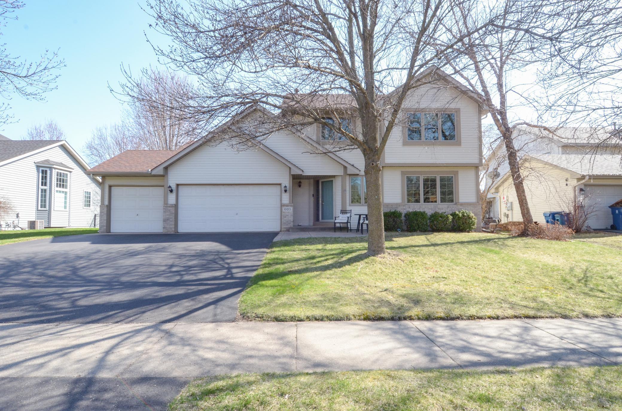 10013 Hidden Oaks Lane, Champlin, Minnesota image 1