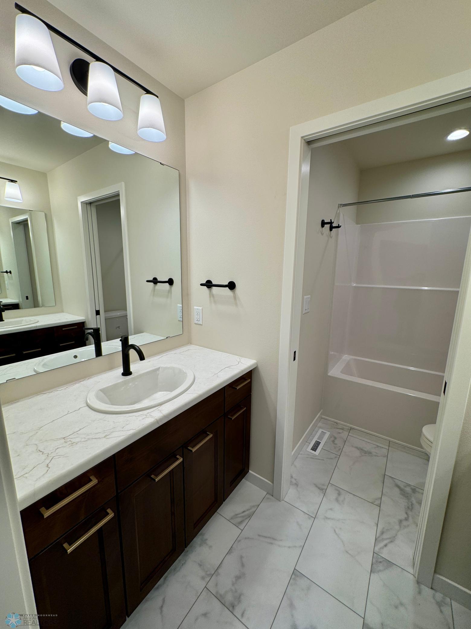 Harwood, North Dakota 58042, United States, 4 Bedrooms Bedrooms, ,3 BathroomsBathrooms,Residential,Pending,100986