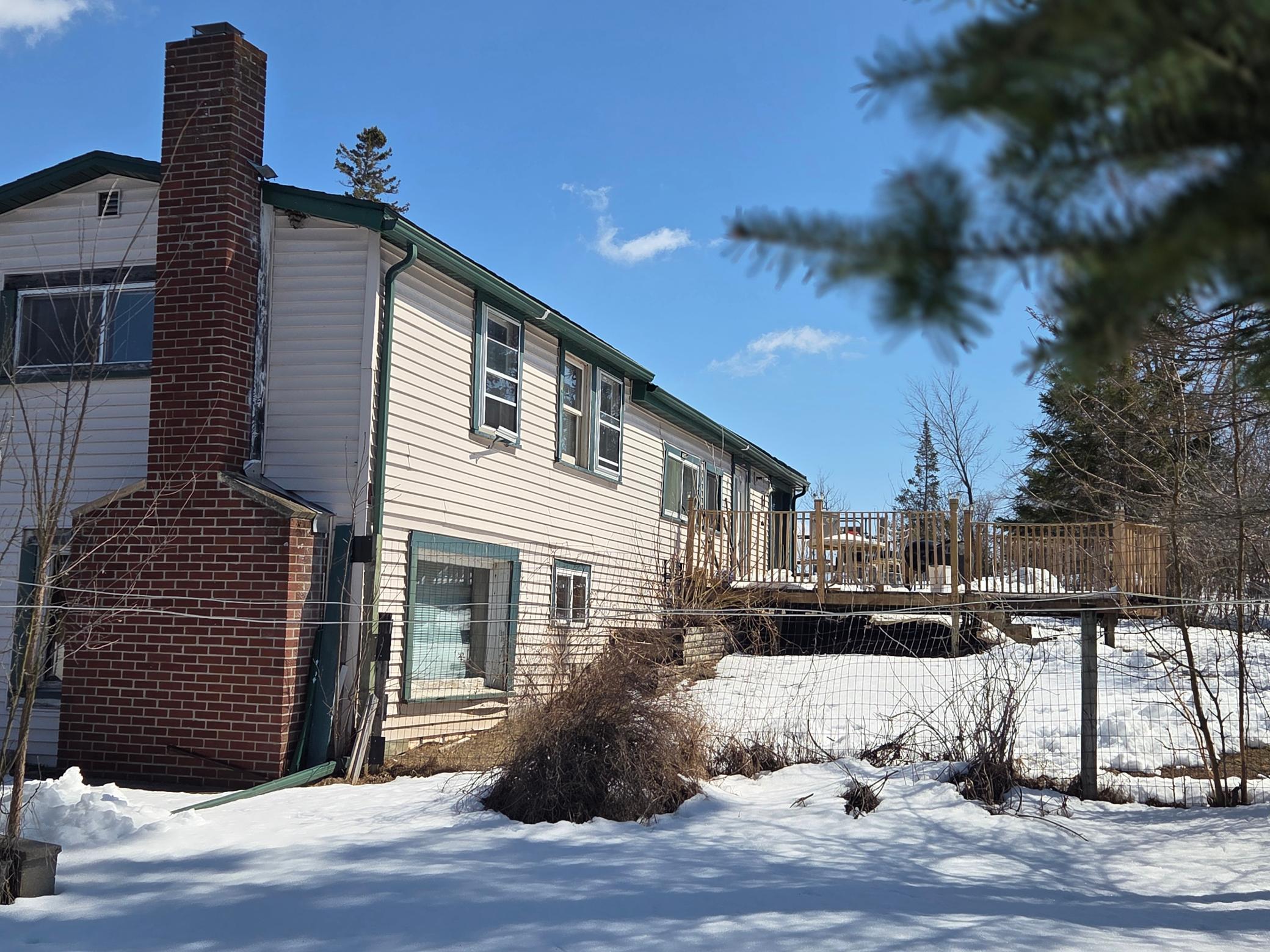 4501 Birchmont Dr exterior deck side.jpg