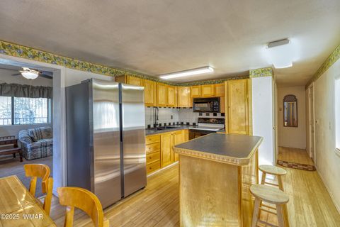 Tiny photo for 1987 Stagg Run, Overgaard, AZ 85928 (MLS # 257986)
