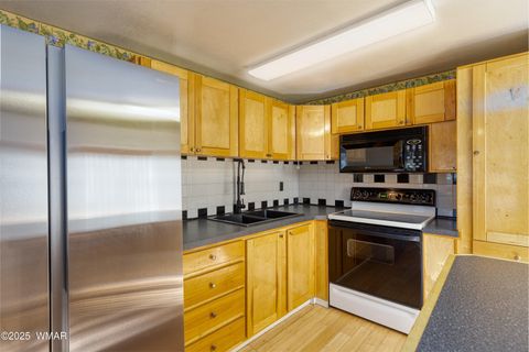 Tiny photo for 1987 Stagg Run, Overgaard, AZ 85928 (MLS # 257986)