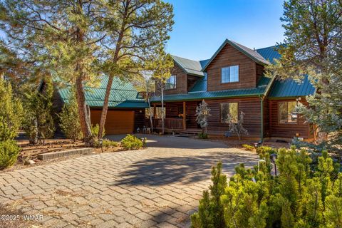 Photo of 2337 Puma Circle, Overgaard, AZ 85933 (MLS # 254419)