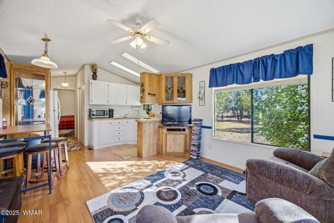 Tiny photo for 2169 Tenderfoot Trail, Overgaard, AZ 85933 (MLS # 258418)