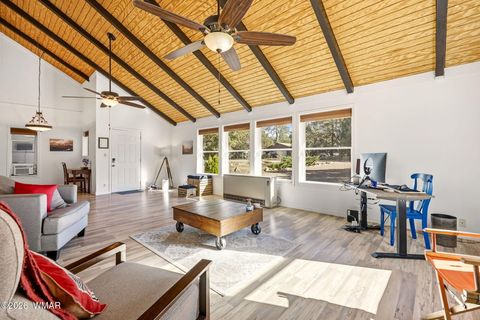 Tiny photo for 1980 Pine Cone Circle, Overgaard, AZ 85933 (MLS # 260050)