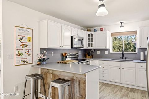 Tiny photo for 1980 Pine Cone Circle, Overgaard, AZ 85933 (MLS # 260050)