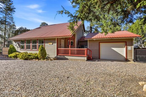 Tiny photo for 1980 Pine Cone Circle, Overgaard, AZ 85933 (MLS # 260050)