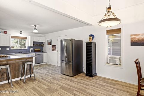 Tiny photo for 1980 Pine Cone Circle, Overgaard, AZ 85933 (MLS # 260050)