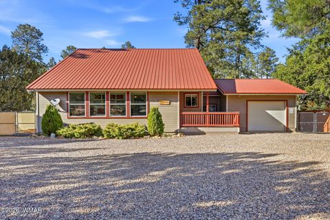 Photo of 1980 Pine Cone Circle, Overgaard, AZ 85933 (MLS # 260050)