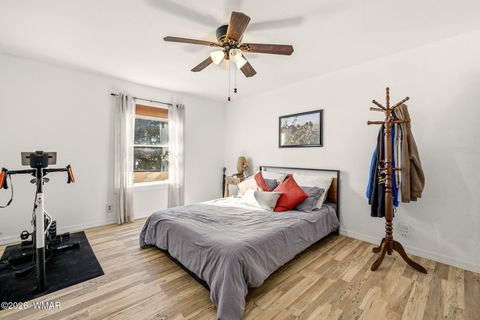 Tiny photo for 1980 Pine Cone Circle, Overgaard, AZ 85933 (MLS # 260050)