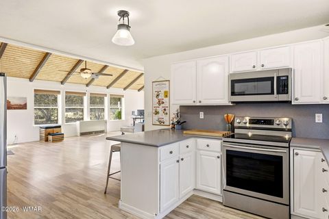 Tiny photo for 1980 Pine Cone Circle, Overgaard, AZ 85933 (MLS # 260050)