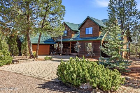 Photo of 2337 Puma Circle, Overgaard, AZ 85933 (MLS # 259708)