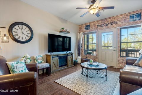 Tiny photo for 2407 Quarter Horse Trail #131, Overgaard, AZ 85933 (MLS # 255372)