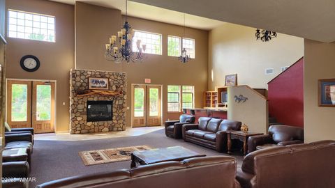 Tiny photo for 2407 Quarter Horse Trail #131, Overgaard, AZ 85933 (MLS # 255372)