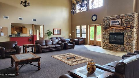 Tiny photo for 2407 Quarter Horse Trail #131, Overgaard, AZ 85933 (MLS # 255372)