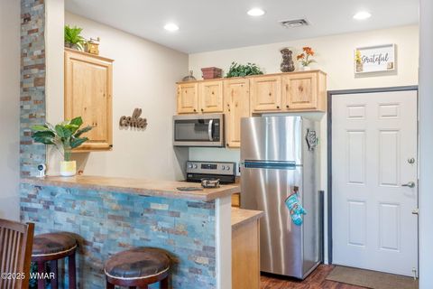 Tiny photo for 2407 Quarter Horse Trail #131, Overgaard, AZ 85933 (MLS # 255372)