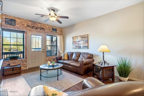 Tiny photo for 2407 Quarter Horse Trail #131, Overgaard, AZ 85933 (MLS # 255372)