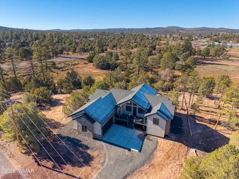 Photo of 1022 School House Lane, Show Low, AZ 85901 (MLS # 258870)