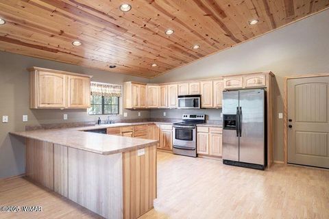 Tiny photo for 3244 Outlaw Trail, Overgaard, AZ 85933 (MLS # 255768)