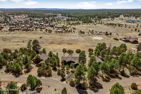 Photo of 2219 Fairway Drive, Overgaard, AZ 85933 (MLS # 255320)